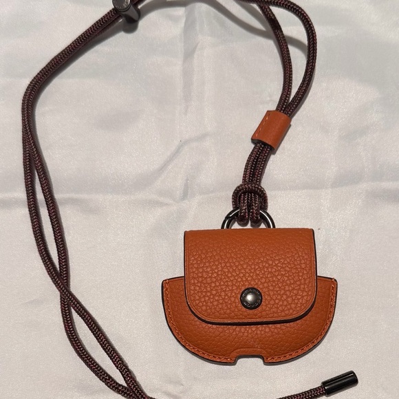 NWOT Coach large wireless earbud case, orange pebble leather w/lanyard strap - Picture 1 of 3